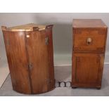 A George III mahogany bowfront hanging corner cupboard, 68cm wide x 103cm high,