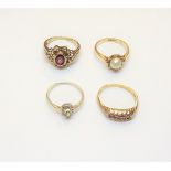 A 9ct gold and ruby set five stone ring, a 9ct gold, diamond and red gem set ring,