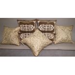 A group of seven 20th century scatter cushions, to include a set of four and three others,