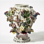 A Bow frill vase, circa 1765, with female mask and foliage handles,