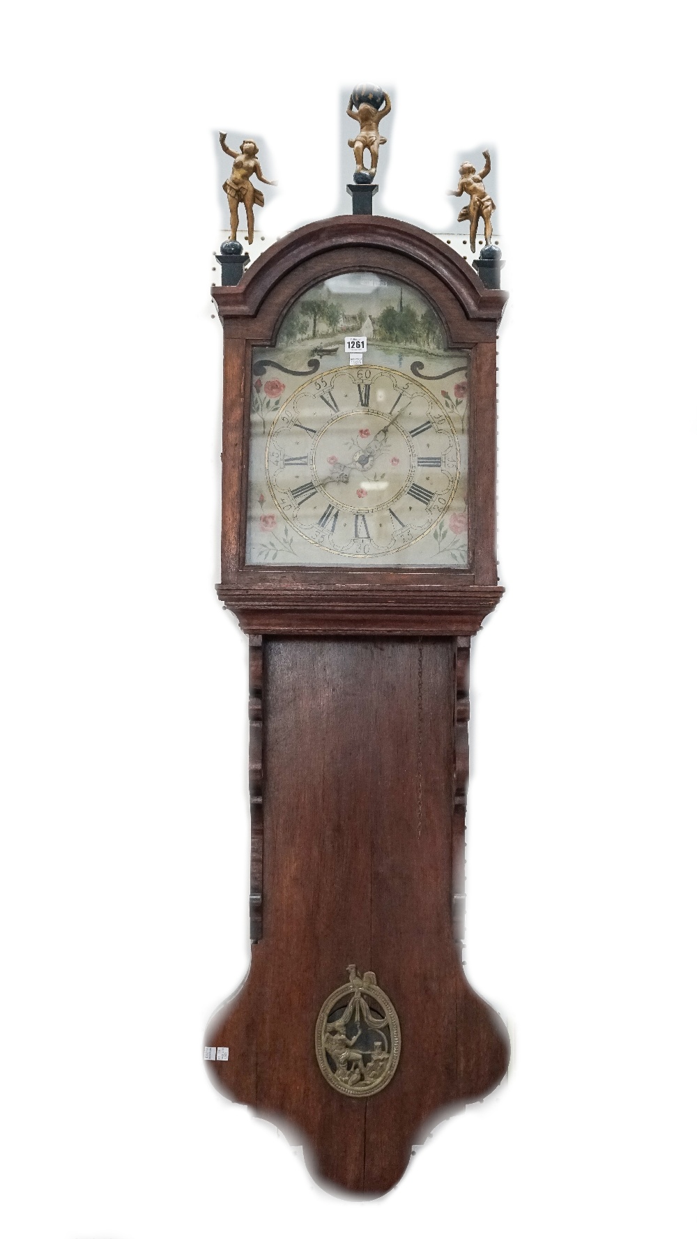 A 19th century Dutch oak cased Zaandam wall clock, with glazed hood and painted tin dial,