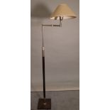 A 20th century chrome and hardwood reading lamp, on square plinth base, 120cm high.