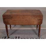 A Regency mahogany drop flap single drawer Pembroke table on reeded tapering supports,