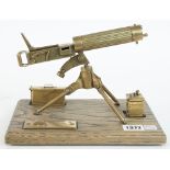 A brass model of a WW I Vickers machine gun, 20th century,