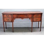 A George III style mahogany bowfront sideboard, on tapering square supports, 184cm wide x 92cm high.