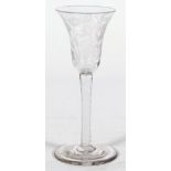 A Jacobite- type wine glass, circa 1765, the bell bowl probably engraved later with a rose,