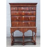 A George I and later walnut chest on stand,