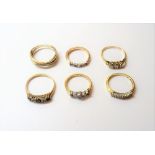 A 9ct gold, sapphire and diamond set five stone ring, two gold, sapphire and diamond set rings,