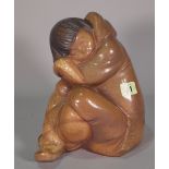 A Lladro matte glaze figure of a sleeping Eskimo, blue printed mark to base, 25cm high.