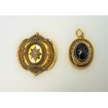 A Victorian gold, black enamelled and banded agate pendant mourning locket,