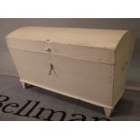 An early 20th century white painted pine dome top trunk, 100cm wide x 65cm high.
