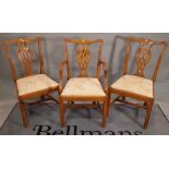 A set of six George III style stained beech dining chairs to include two carvers,