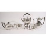 A silver composite three piece tea set, comprising; a teapot having ebonised fittings,