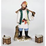 A Russian porcelain figure of a water carrier, Kornilov factory, circa.