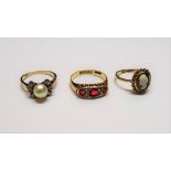 An 18ct gold, red gem and diamond set ring, Birmingham 1918, gross weight 3.
