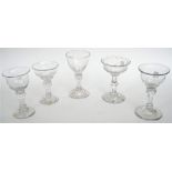 A group of five sweetmeat glasses, circa 1750-1780, four with a pedestal stem and domed foot,