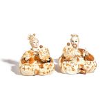 A good pair of German porcelain nodding head pagoda figures, late 19th century,