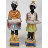 A pair of French faience Blackamoor figures, late 19th/early 20th century,