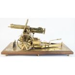 A brass model of a WW I Vickers machine gun, 20th century,