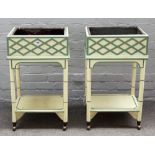 A pair of 20th century green and cream painted rectangular jardinieres on stands,