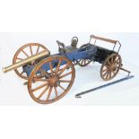 A large bronze model of a field gun with blue painted wooden carriage and limber, mid-20th century,