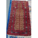 A Beluchistan prayer rug, the camel field with three flowering trees, matching spandrels,