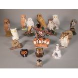 A quantity of assorted models of owls, ceramic, metal and other examples, the largest 11cm high,