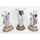 A pair of French figural comport bases and another similar, late 19th century,