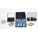 A set of twelve silver teaspoons, Sheffield 1932, with a matching pair of sugar tongs,