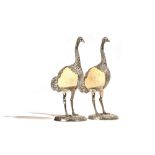 In the manner of Gabriella Crespi a pair of white metal ostrich egg ostriches, 20th century,