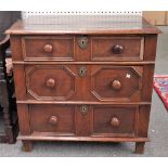 A small 17th century oak chest, with three long geometric moulded drawers, on block feet,