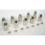 A set of five silver salts and a set of five silver matching pepperettes,