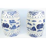 A pair of modern Chinese style blue and white pottery garden seats decorated with landscape scenes,