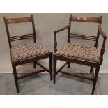 A set of seven 19th century mahogany bar back dining chairs to include one carver,