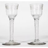 A pair of opaque twist wine glasses, circa 1765,