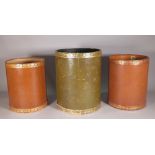 A pair of 20th century tan leather cylindrical waste paper bins,