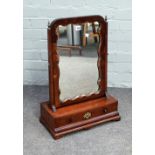 A mid-18th century swing frame toilet mirror, with cushion single drawer base, on bracket feet,