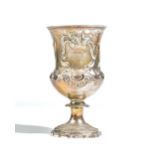 A Victorian silver prize goblet, of campana form, decorated with yachts on a choppy sea,