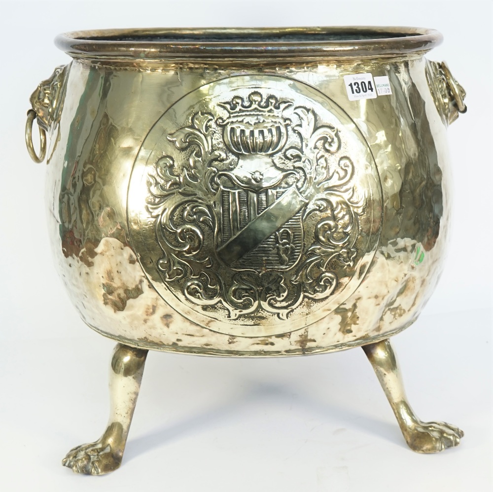 A Victorian polished brass log bin of circular form,