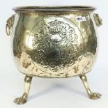A Victorian polished brass log bin of circular form,