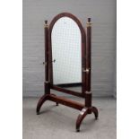 A French Empire gilt metal mounted mahogany cheval mirror,