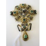 A foil backed emerald, gilt, enamelled and gem set pendant, in a Renaissance revival design,