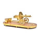 A brass desk set in the form of a Russian Maxim machine gun, 20th century,