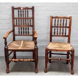 A matched set of six Lancashire oak and ash bobbin back dining chairs on turned supports,
