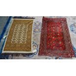 A Beshir rug, the madder field with trellis heading, simple flowers,