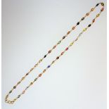 A gold and multi-coloured sapphire set necklace, mounted with oval cut sapphires in multi colours,