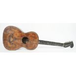 An unusual guitar, probably early 20th century, with indistinct paper label to the interior,