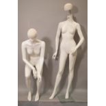 Two 20th century female full body manequinns of various poses, the tallest 180cm high, (2).