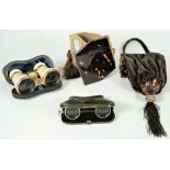 A pair of Victorian brass and ivory bound opera glasses in a velvet lined leather case,