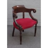 A 19th century French oak tub back desk chair, with serpentine seat, on reeded supports,